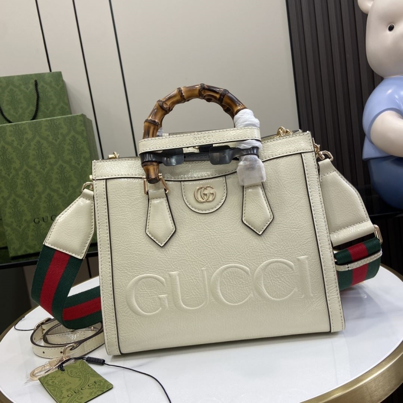 G*u*i top handle bags